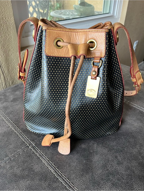 Dooney & Bourke Handbags - Dooney & Bourke-Vintage Black and Tan Drawstring Bucket Bag with Gold Studs